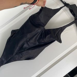 Naked wardrobe faux leather thong bodysuit